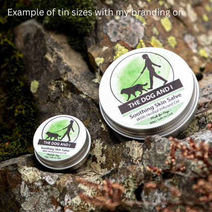 Two tins of 'The Dog And I' Soothing Skin Salve on a natural rock background